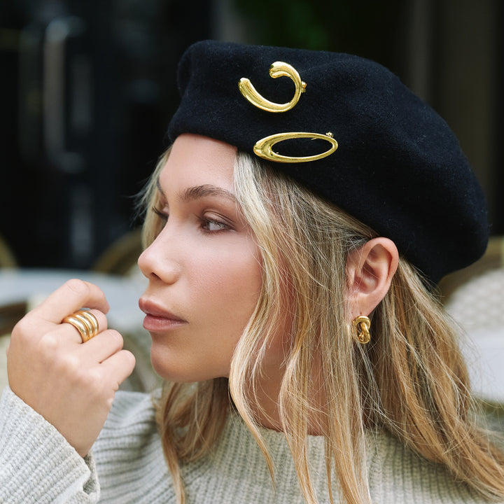 Siv – twisted stud earrings in stainless steel, gold | Timi of Sweden